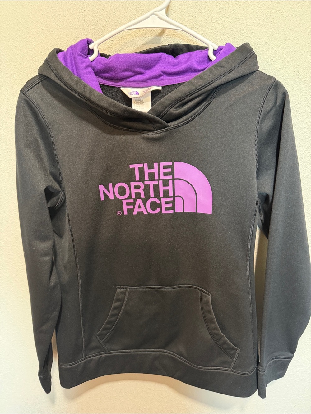The North Face Black Hoodie with Purple Logo & Lined Hood